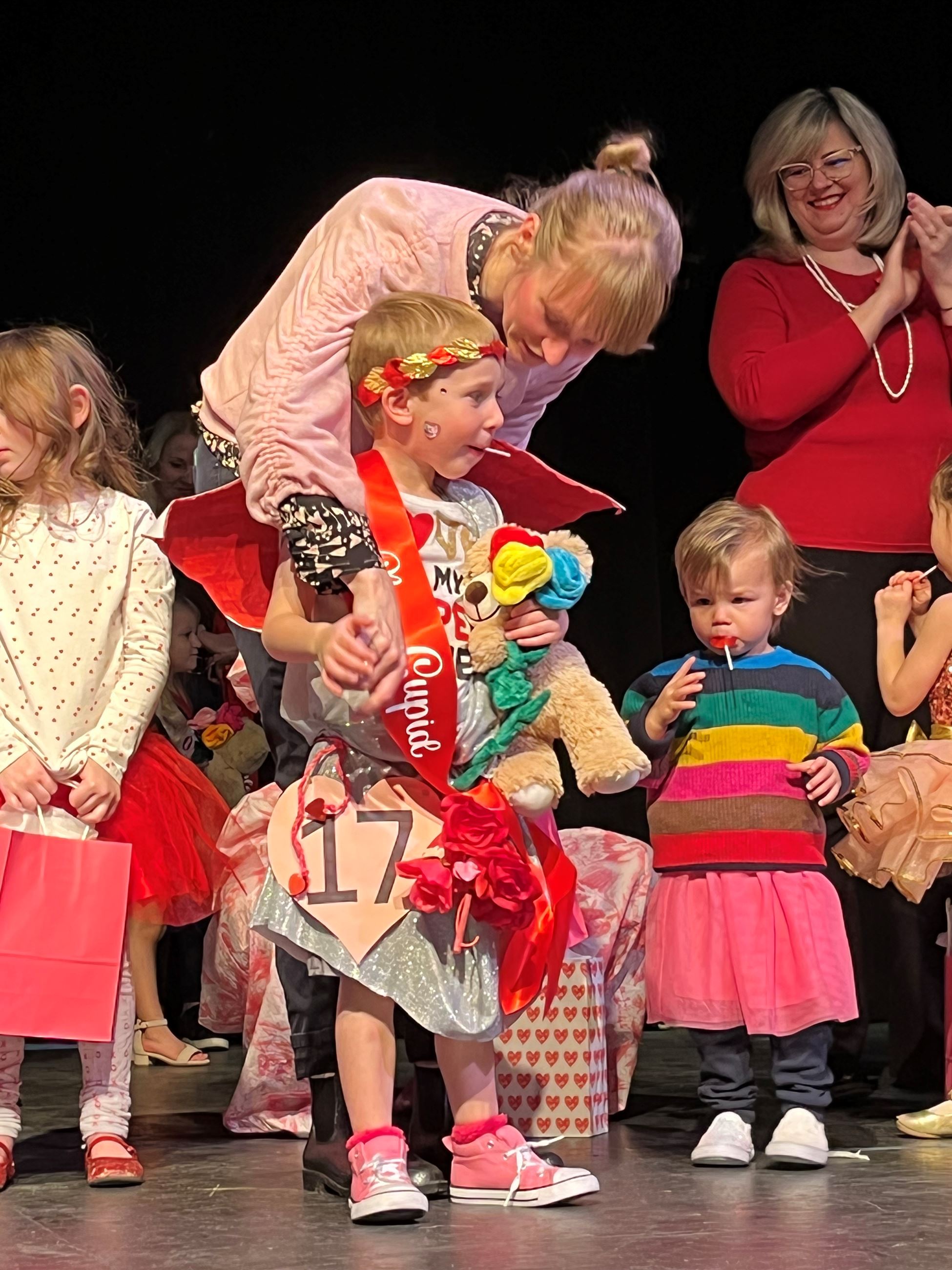 Child dressed up as Cupid for valentine pageant