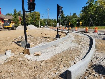 Construction of road curb and sidewalks