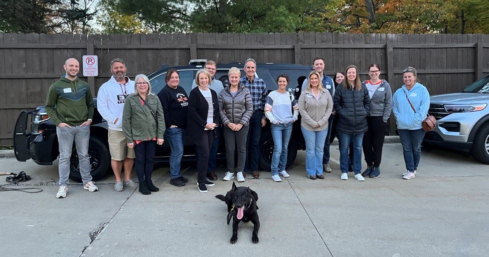 Loveland U Group Photo at Police Station